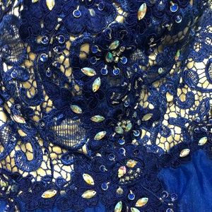 Mini dark blue puffy prom dress.